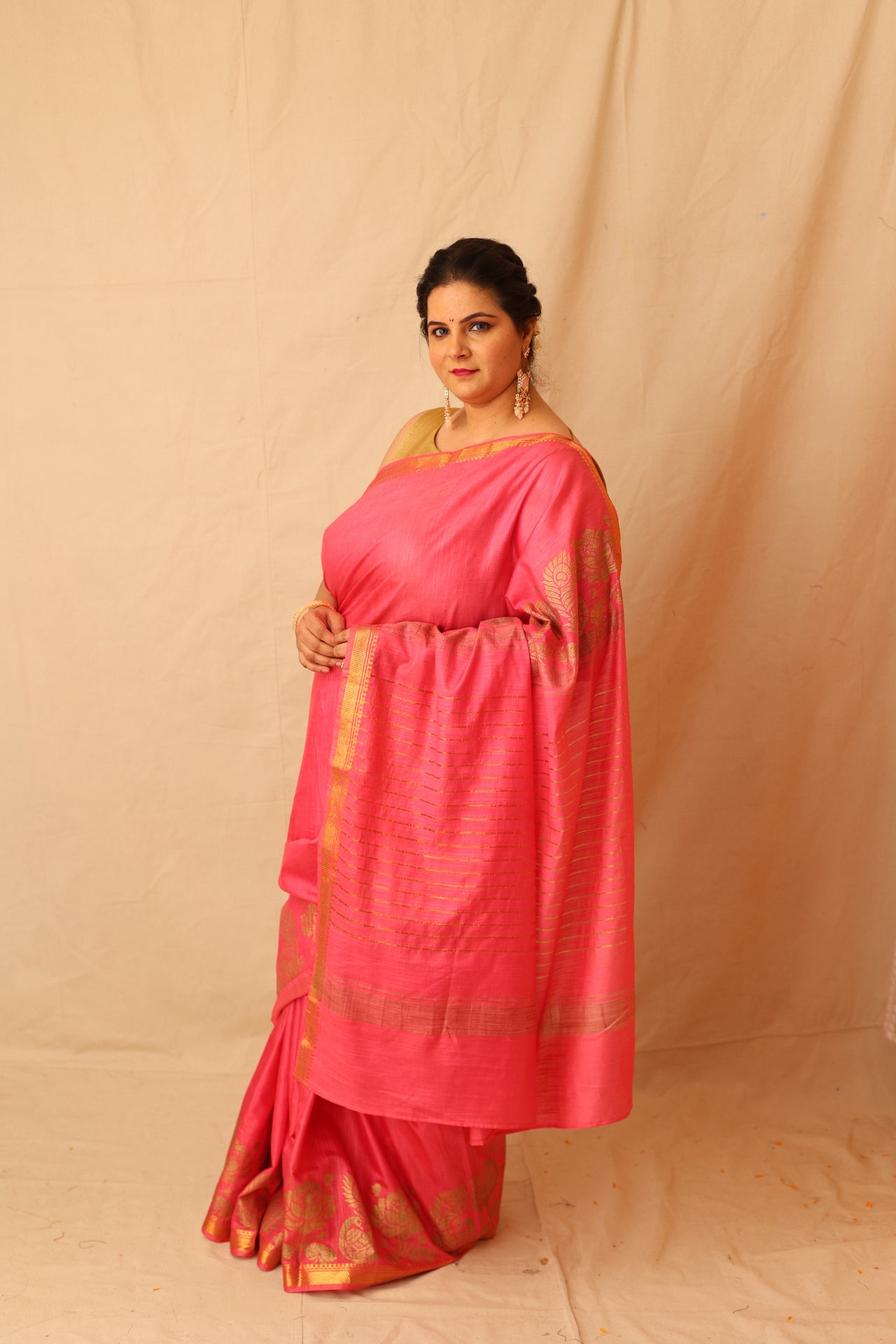 Mesmerizing Pink Semi-Silk Saree with Gold Lotus & Peacock Border Print
