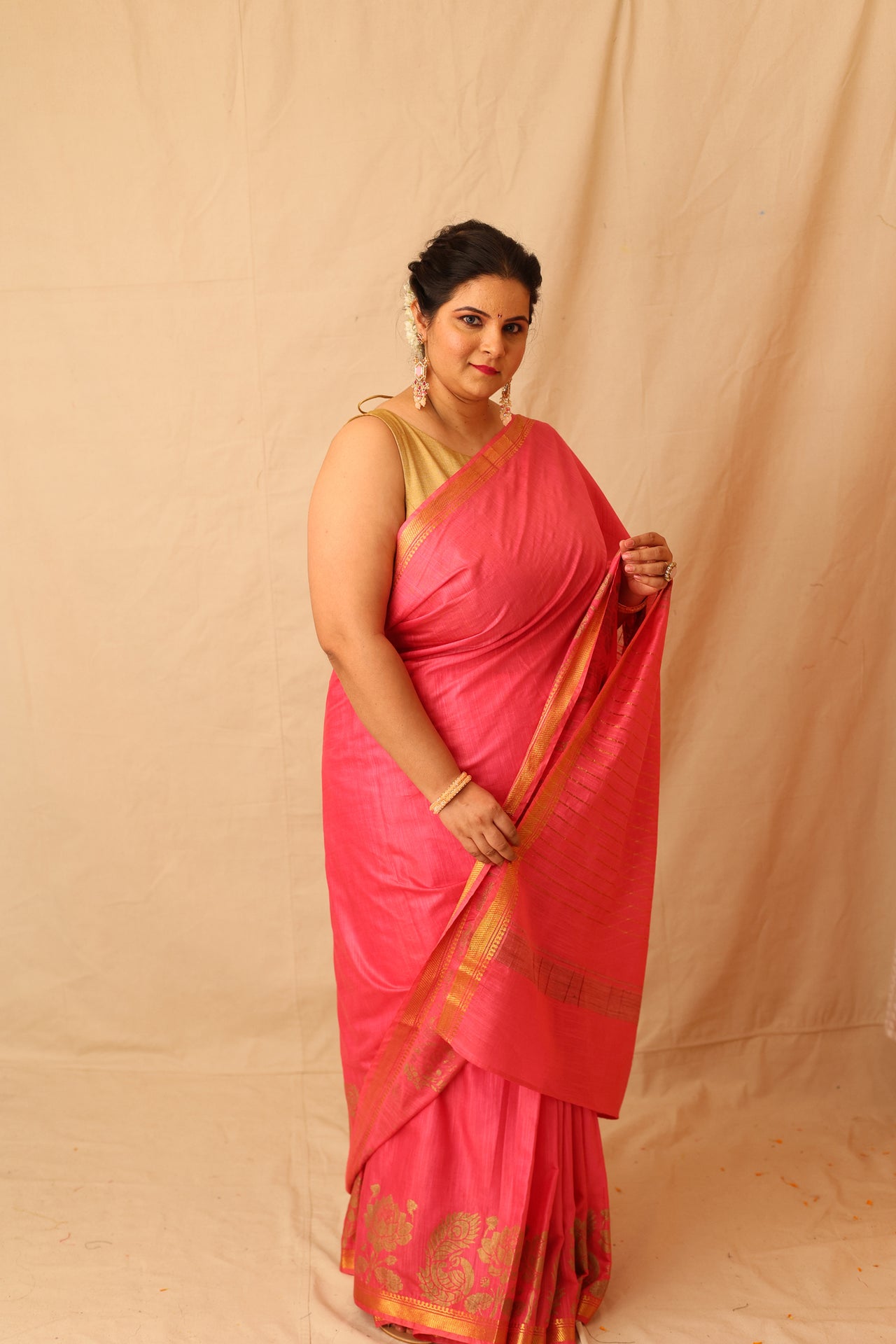 Mesmerizing Pink Semi-Silk Saree with Gold Lotus & Peacock Border Print