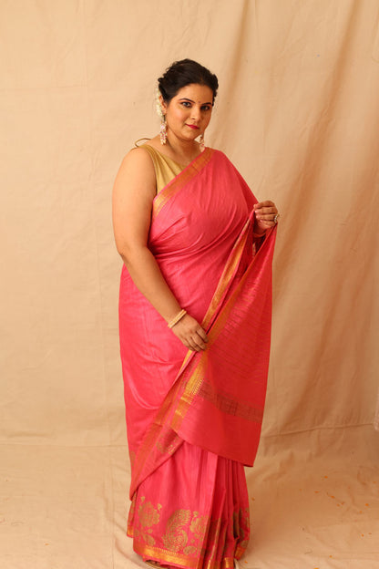 Mesmerizing Pink Semi-Silk Saree with Gold Lotus & Peacock Border Print