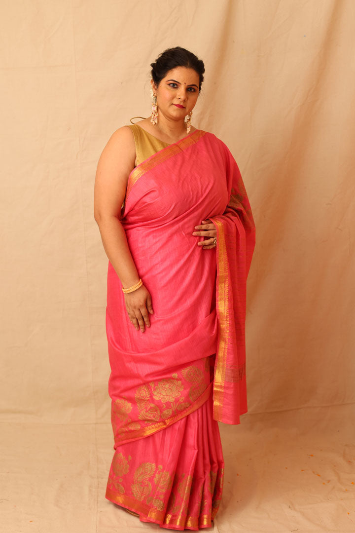 Mesmerizing Pink Semi-Silk Saree with Gold Lotus & Peacock Border Print