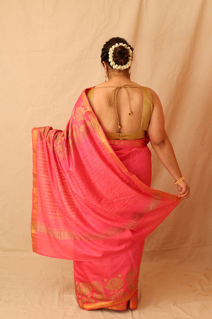 Mesmerizing Pink Semi-Silk Saree with Gold Lotus & Peacock Border Print