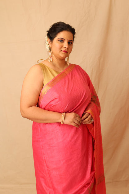 Mesmerizing Pink Semi-Silk Saree with Gold Lotus & Peacock Border Print