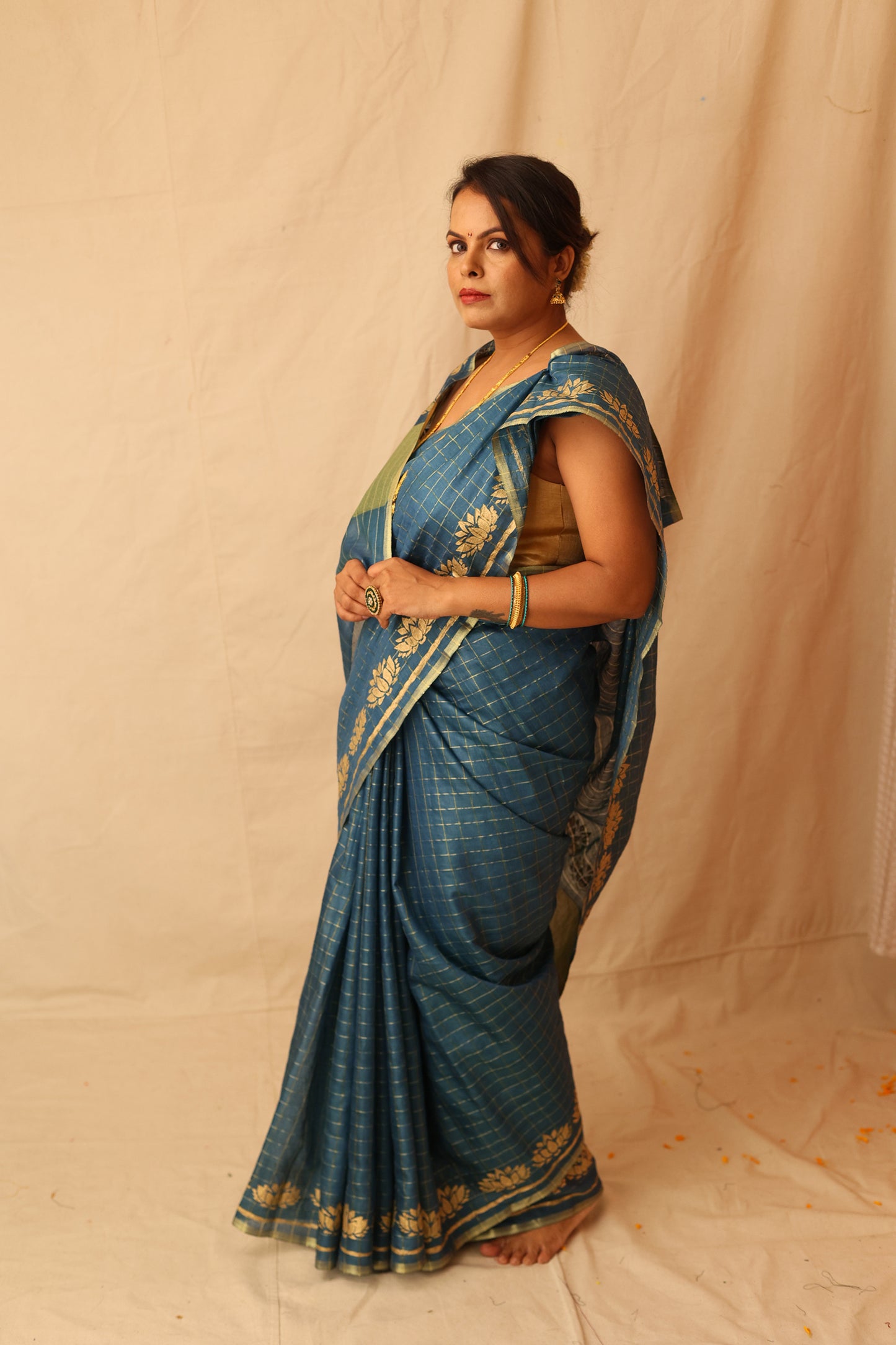 Traditional and Festive Green Semi-Silk Saree with Zari Checks Design