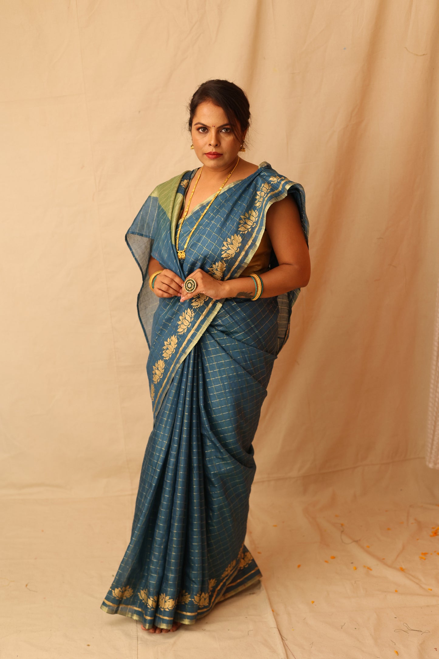 Traditional and Festive Green Semi-Silk Saree with Zari Checks Design