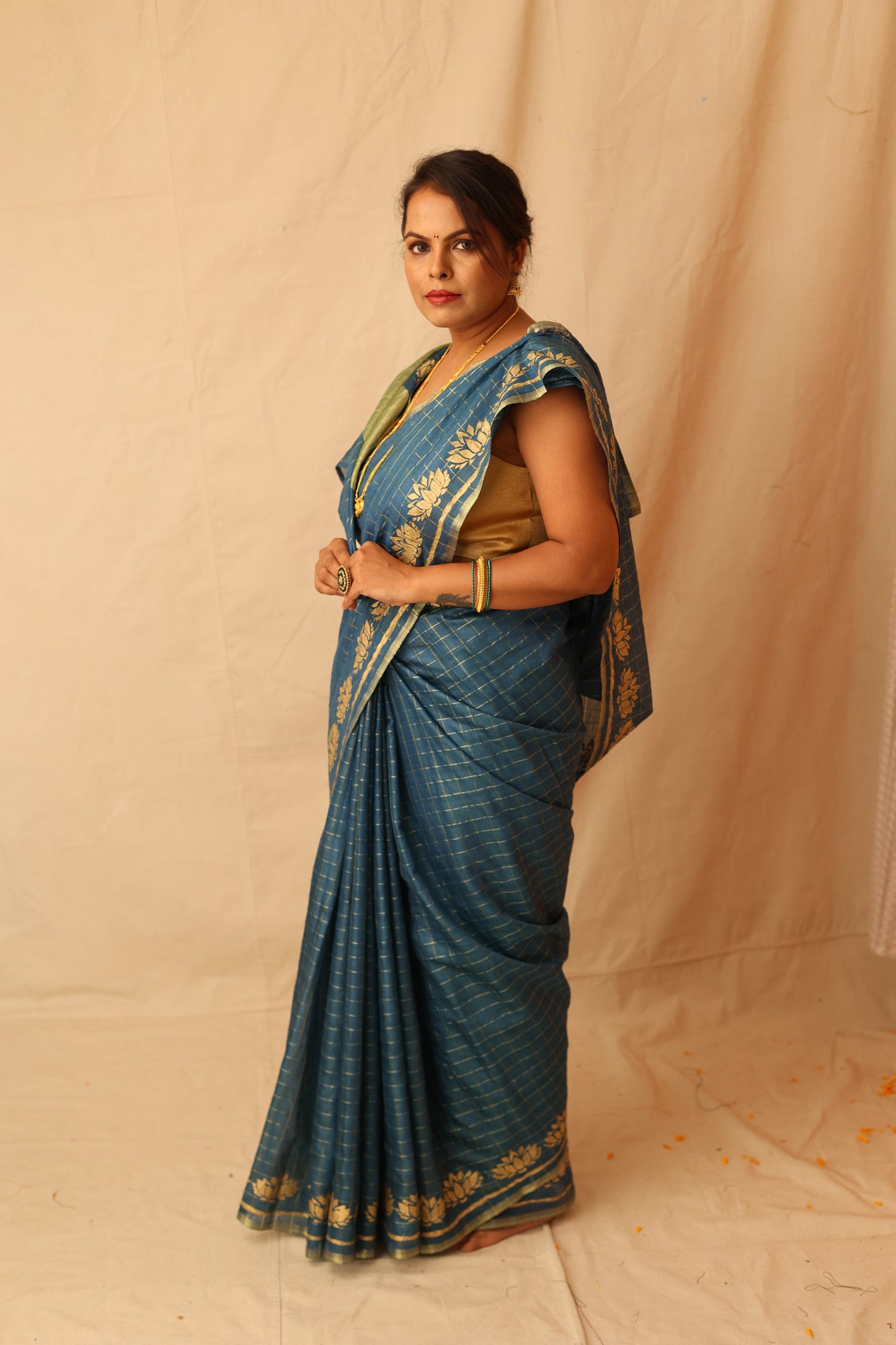 Traditional and Festive Green Semi-Silk Saree with Zari Checks Design