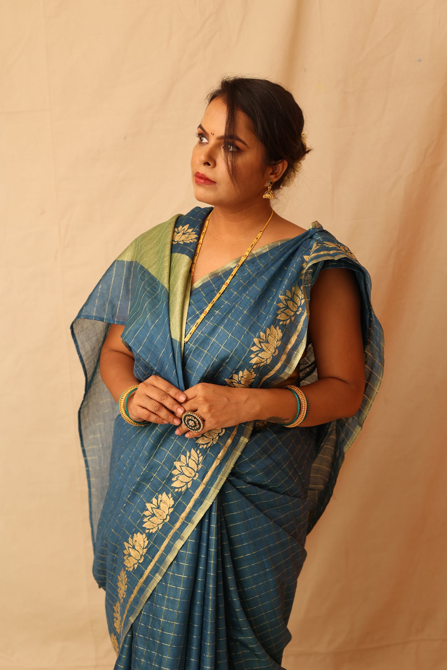 Traditional and Festive Green Semi-Silk Saree with Zari Checks Design