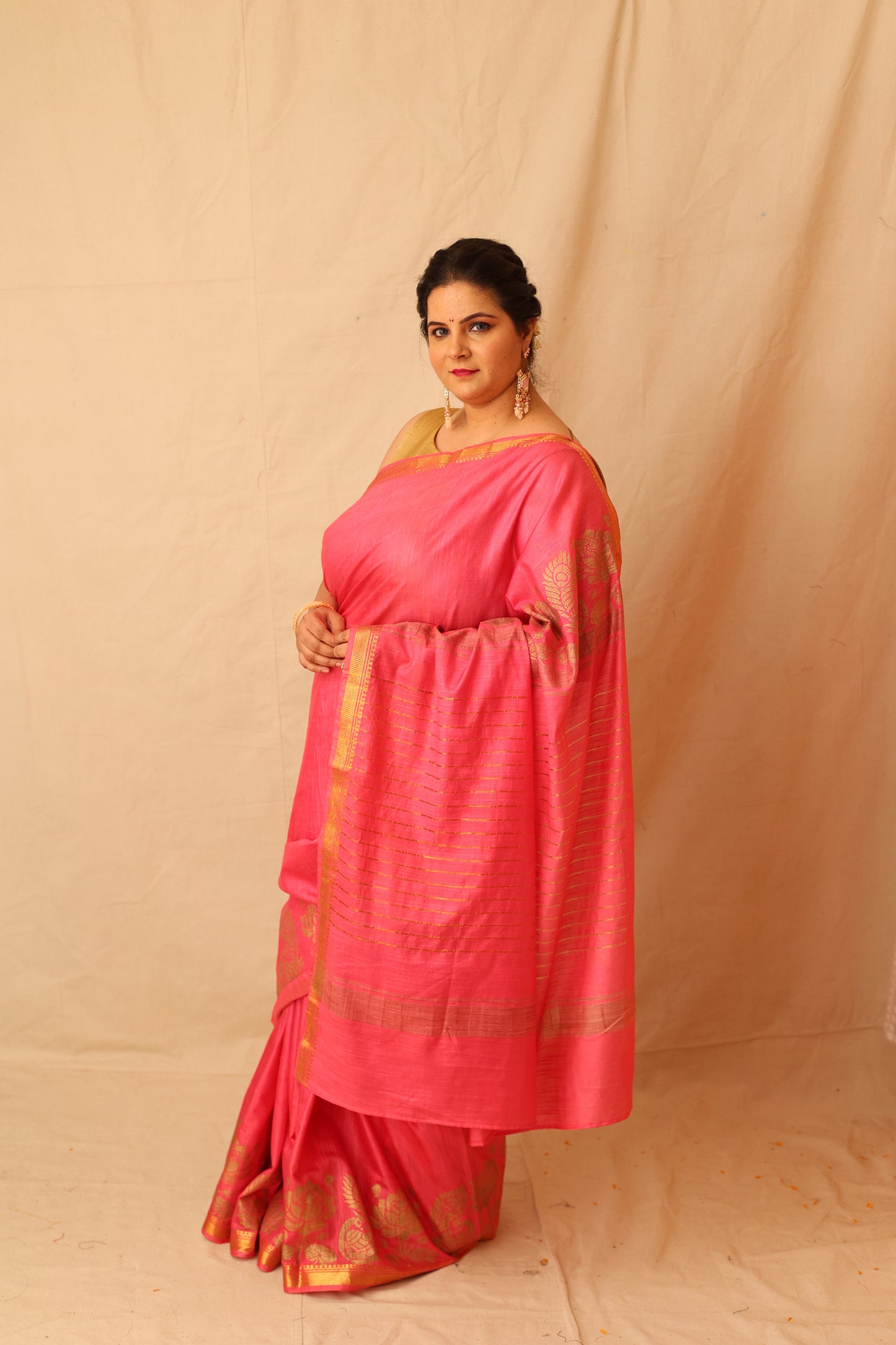 Mesmerizing Pink Semi-Silk Saree with Gold Lotus & Peacock Border Print